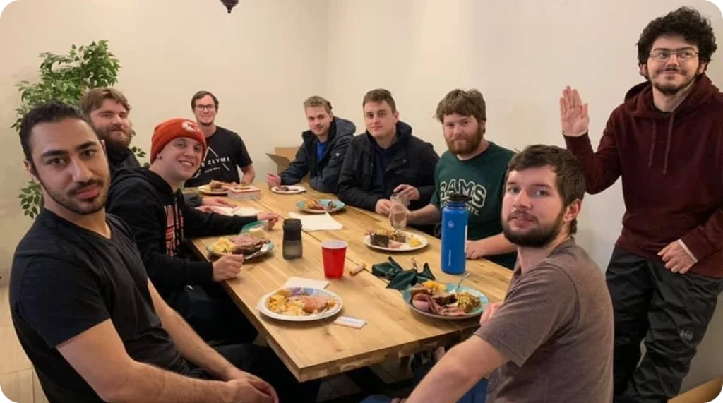 Young men sharing a meal at the Forte Strong failure to launch program in St. George, Utah