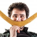 Young man with a boomerang
